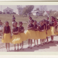 MAF0291_photograph-of-simms-school-girls-in-black-and.jpg